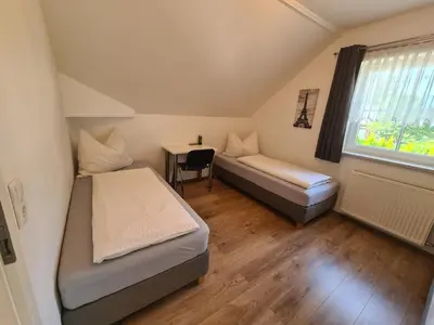 Ein Bett oder Betten in einem Zimmer der Unterkunft Ferienwohnung Schupfer - Free Parking, Seenähe & 5 Skigebieten