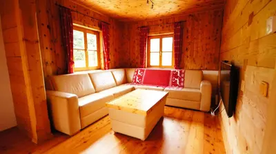Ein Sitzbereich in der Unterkunft Chalet Lisa