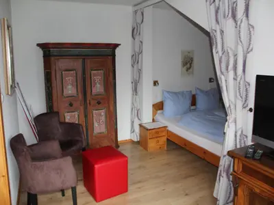 Ein Bett oder Betten in einem Zimmer der Unterkunft Ferienwohnung Laserer