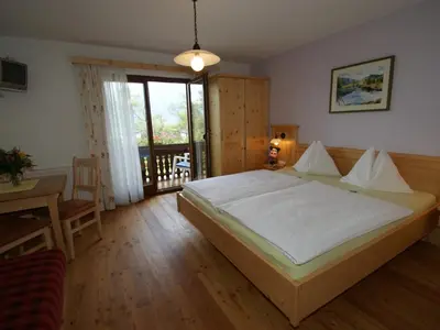 Ein Bett oder Betten in einem Zimmer der Unterkunft Biobauernhof Nussbaumer