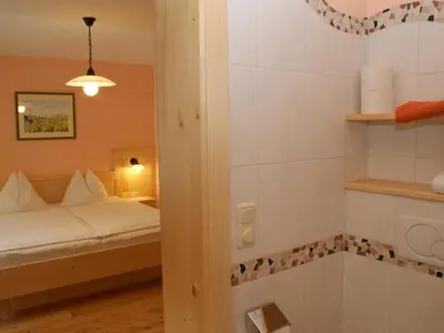 Ein Bett oder Betten in einem Zimmer der Unterkunft Biobauernhof Nussbaumer