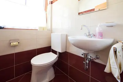 Ein Badezimmer in der Unterkunft Oberauhof