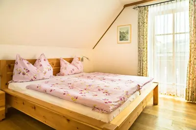Ein Bett oder Betten in einem Zimmer der Unterkunft Bio Bauernhof Schoberhof