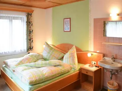 Ein Bett oder Betten in einem Zimmer der Unterkunft Apartment in Hüttau near Ski Amadé Slopes