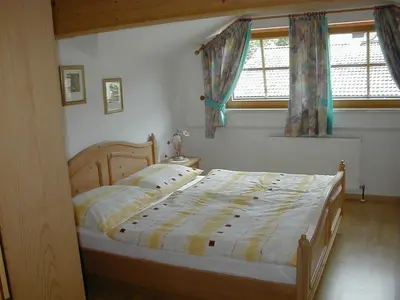 Ein Bett oder Betten in einem Zimmer der Unterkunft Ferienwohnung Maria Gstatter