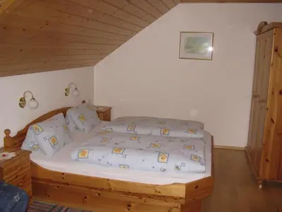 Ein Bett oder Betten in einem Zimmer der Unterkunft Haus Pfarrkirchner