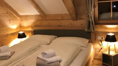 Ein Bett oder Betten in einem Zimmer der Unterkunft Mankerl Hütte Lachtal