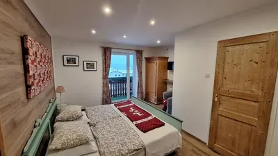 Ein Bett oder Betten in einem Zimmer der Unterkunft Haus Hepi