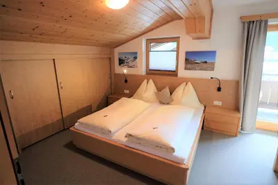 Ein Bett oder Betten in einem Zimmer der Unterkunft Haus Weitgasser