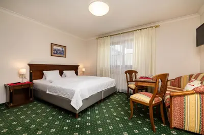 Ein Bett oder Betten in einem Zimmer der Unterkunft Pension Kreuzer