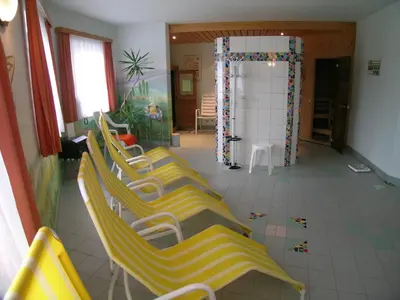 Ein Sitzbereich in der Unterkunft Hotel Tischlbergerhof