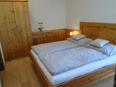 Ein Bett oder Betten in einem Zimmer der Unterkunft Appartement Gipfelsturm