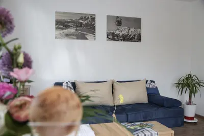 Ein Sitzbereich in der Unterkunft Appartments am Esslgut