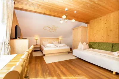 Ein Bett oder Betten in einem Zimmer der Unterkunft Hotel Garni Sonnhof