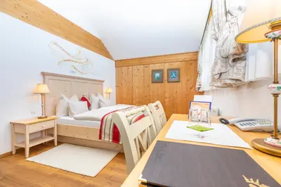 Ein Bett oder Betten in einem Zimmer der Unterkunft Hotel Garni Sonnhof