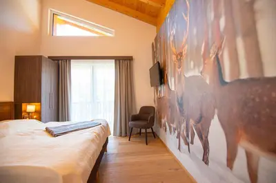 Ein Bett oder Betten in einem Zimmer der Unterkunft Apartment Dorf Wagrain Alpenleben by AlpenTravel