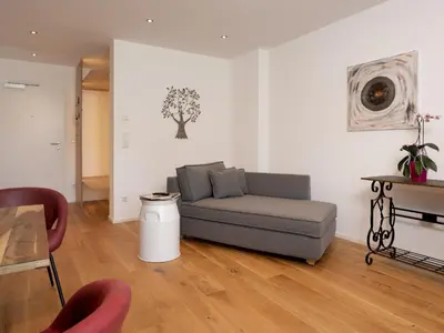 Ein Sitzbereich in der Unterkunft Brunnwirt ESSEN & WOHNEN
