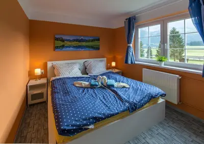 Ein Bett oder Betten in einem Zimmer der Unterkunft Kukoricza Hacienda
