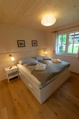 Ein Bett oder Betten in einem Zimmer der Unterkunft Chalet 164