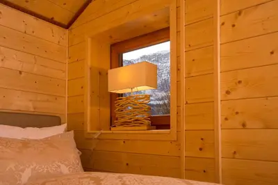 Ein Bett oder Betten in einem Zimmer der Unterkunft Chalet Obertraun