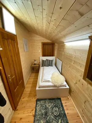 Ein Bett oder Betten in einem Zimmer der Unterkunft Chalet Obertraun