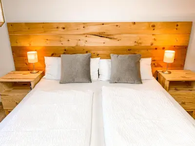 Ein Bett oder Betten in einem Zimmer der Unterkunft Haus Traun-Ufer - Riverside Townhouse