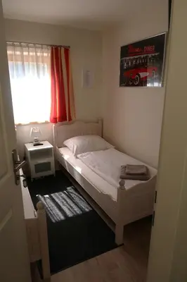 Ein Bett oder Betten in einem Zimmer der Unterkunft Donna Lea
