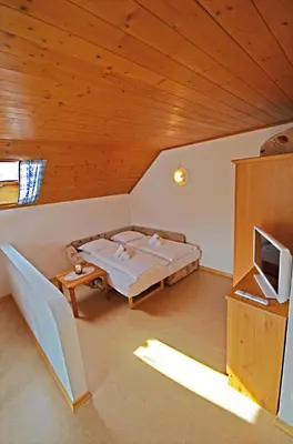Ein Bett oder Betten in einem Zimmer der Unterkunft Appartements Mantinger
