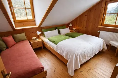 Ein Bett oder Betten in einem Zimmer der Unterkunft Chalet Steiermark