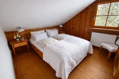 Ein Bett oder Betten in einem Zimmer der Unterkunft Chalet Steiermark