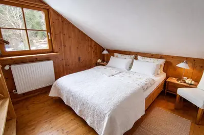 Ein Bett oder Betten in einem Zimmer der Unterkunft Chalet Steiermark