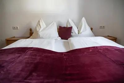 Ein Bett oder Betten in einem Zimmer der Unterkunft Haus Alpenflora