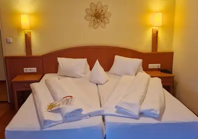 Ein Bett oder Betten in einem Zimmer der Unterkunft FEWO Gabi Haus Pacher