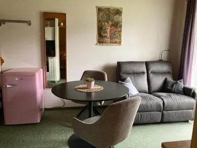 Ein Sitzbereich in der Unterkunft Ellmauhof