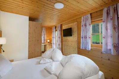Ein Bett oder Betten in einem Zimmer der Unterkunft Walchauhof