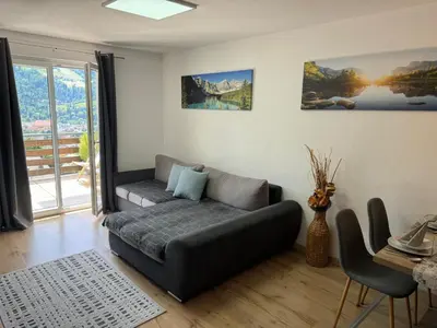 Ein Sitzbereich in der Unterkunft Schnelli Appartement Schladming