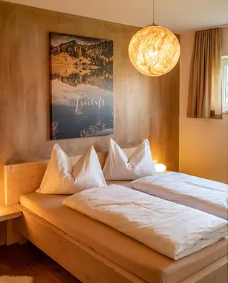 Ein Bett oder Betten in einem Zimmer der Unterkunft Haus LandArt