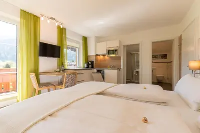 Ein Bett oder Betten in einem Zimmer der Unterkunft Landhaus Tripolt