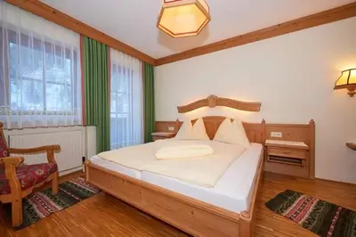 Ein Bett oder Betten in einem Zimmer der Unterkunft Hotel Koch