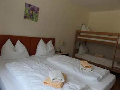 Ein Bett oder Betten in einem Zimmer der Unterkunft Eckenhof