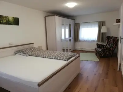 Ein Bett oder Betten in einem Zimmer der Unterkunft Ferienwohnung Schmied 3