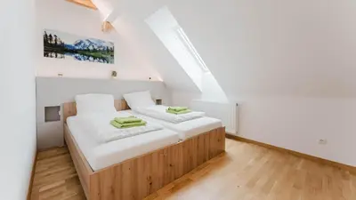 Ein Bett oder Betten in einem Zimmer der Unterkunft Moderne Ferienwohnung mit Bergblick