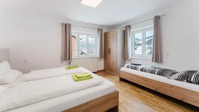 Ein Bett oder Betten in einem Zimmer der Unterkunft Moderne Ferienwohnung mit Bergblick