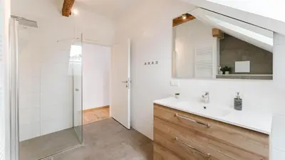 Ein Badezimmer in der Unterkunft Moderne Ferienwohnung mit Bergblick