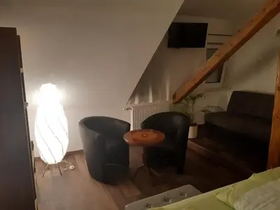 Ein Sitzbereich in der Unterkunft Cafe Pension Rafaela