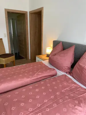 Ein Bett oder Betten in einem Zimmer der Unterkunft Ferienwohnungen Bianca Hasler - Stallbauer