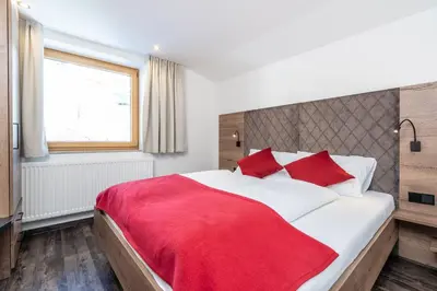 Ein Bett oder Betten in einem Zimmer der Unterkunft Bergappartements Pröll