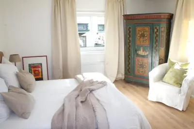 Ein Bett oder Betten in einem Zimmer der Unterkunft Ferienhaus Alpennest