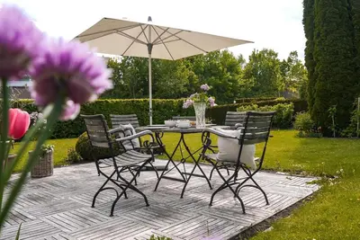 Ein Garten an der Unterkunft Ferienhaus Alpennest