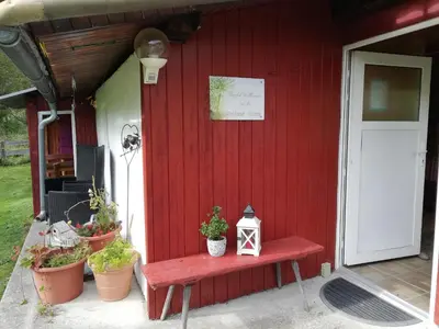 Ein Garten an der Unterkunft Almland Hütte